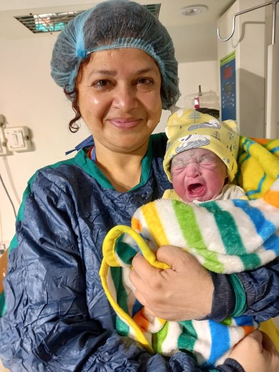 A newborn delivered through Vinsfertility